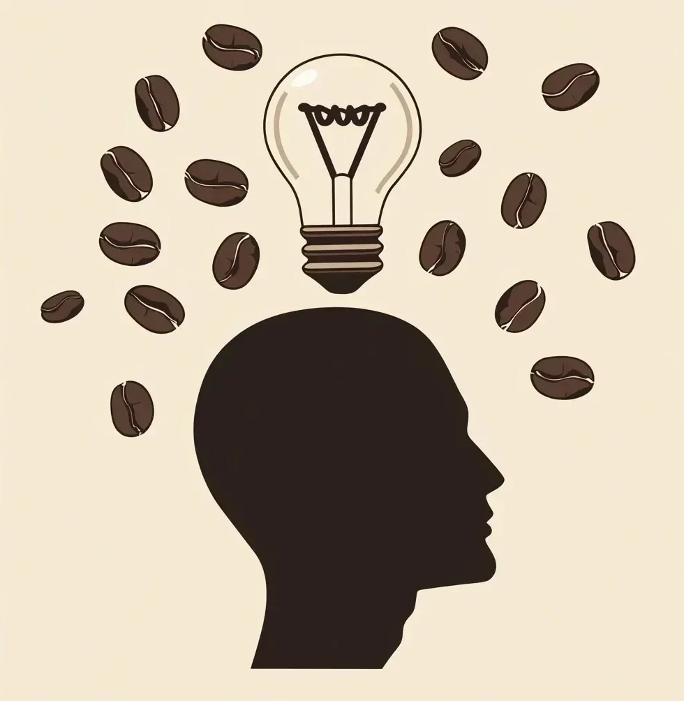 A-silhouette-of-a-human-head-with-a-light-bulb-above-surrounded-by-scattered-coffee-beans-e1748523097798