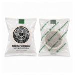 Plastic Free Brew Roaster's Reserve single-serve coffee pod, sealed fresh in a compostable wrapper.
